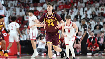 Mar 1, 2025; Lincoln, Nebraska, USA;  Minnesota Golden Gophers guard Brennan Rigsby (24) signals after making a three point attempt against the Nebraska Cornhuskers during the first half at Pinnacle Bank Arena. Mandatory Credit: Steven Branscombe-Imagn Images