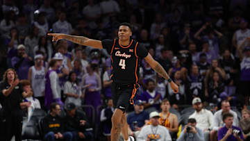 Dec 6, 2025; Phoenix, Arizona, USA; Oklahoma State Cowboys guard Christian Coleman (4) celebrates after making a 3-point shot against the Grand Canyon University Antelopes at PHX Arena. Mandatory Credit: Anna Carrington-Imagn Images