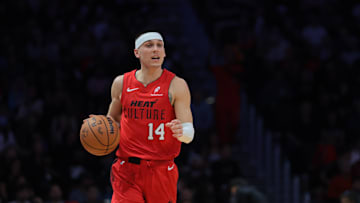 Dec 23, 2024; Miami, Florida, USA; Miami Heat guard Tyler Herro (14) dribbles the basketball against the Brooklyn Nets during the second quarter at Kaseya Center. Mandatory Credit: Sam Navarro-Imagn Images