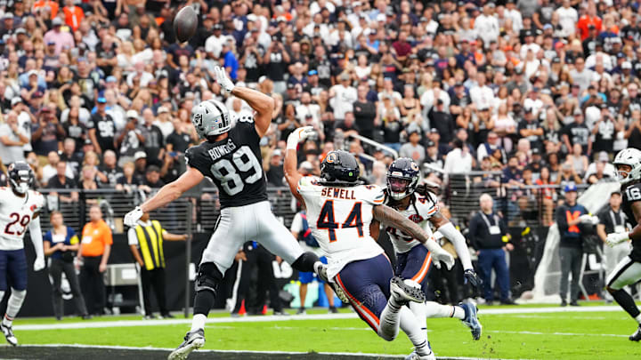 Brock Bowers is defended by Bears linebacker Noah Sewell during the Week 4 Bears win at Las Vegas.