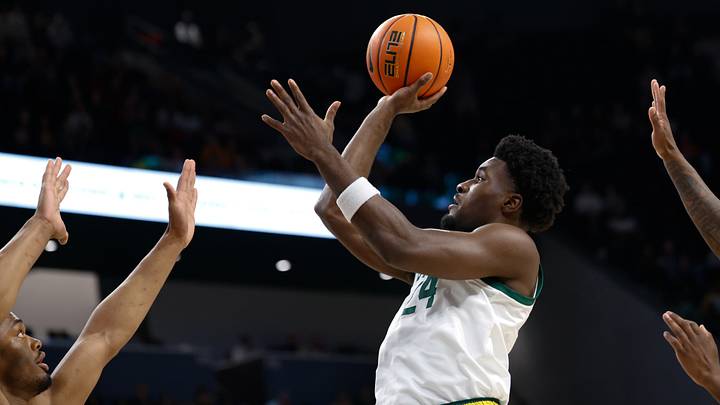 Feb 24, 2026; Waco, Texas, USA; Baylor Bears guard Tounde Yessoufou (24) scores a basket against Arizona Wildcats forward Tobe Awaka (30) during the first half at Paul and Alejandra Foster Pavilion. Mandatory Credit: Chris Jones-Imagn Images Feb 24, 2026; Waco, Texas, USA; Baylor Bears guard Tounde Yessoufou (24) scores a basket against Arizona Wildcats forward Tobe Awaka (30) during the first half at Paul and Alejandra Foster Pavilion. Mandatory Credit: Chris Jones-Imagn Images