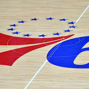 Mar 14, 2021; Philadelphia, Pennsylvania, USA; Philadelphia 76ers logo on the hardwood court against the San Antonio Spurs at Wells Fargo Center. Mandatory Credit: Eric Hartline-Imagn Images