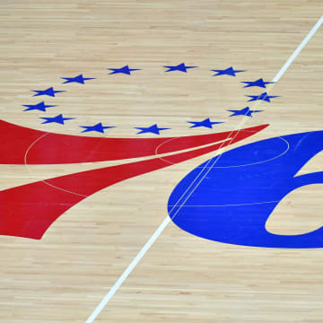 Mar 14, 2021; Philadelphia, Pennsylvania, USA; Philadelphia 76ers logo on the hardwood court against the San Antonio Spurs at Wells Fargo Center. Mandatory Credit: Eric Hartline-USA TODAY Sports