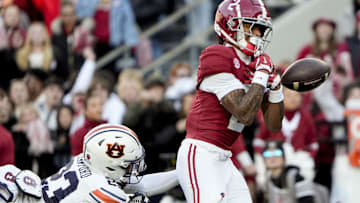 Nov 30, 2024; Tuscaloosa, Alabama, USA;  Alabama Crimson Tide wide receiver Ryan Williams (2) cannot catch a pass in the end zone against Auburn Tigers cornerback Jay Crawford (23) during the first half at Bryant-Denny Stadium. Mandatory Credit: Gary Cosby Jr.-Imagn Images