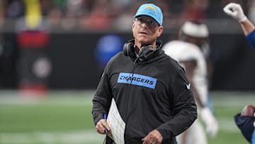 Dec 1, 2024; Atlanta, Georgia, USA; Los Angeles Chargers head coach Jim Harbaugh on the sidelines during the game against the Atlanta Falcons during the first half at Mercedes-Benz Stadium. Mandatory Credit: Dale Zanine-Imagn Images