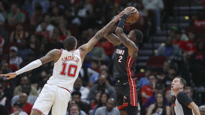 Apr 5, 2024; Houston, Texas, USA; Miami Heat guard Terry Rozier (2) shoots the ball as Houston Rockets forward Jabari Smith Jr. (10) defends during the second quarter at Toyota Center. Mandatory Credit: Troy Taormina-USA TODAY Sports