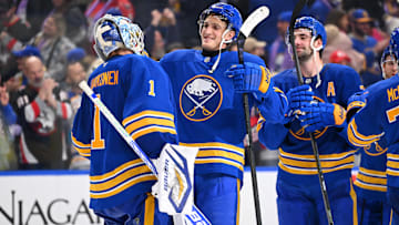 Buffalo Sabres players Ukko-Pekka Luukkonen, Tage Thompson and Mattias Samuelsson