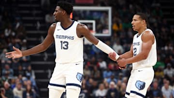 Nov 19, 2023; Memphis, Tennessee, USA; Memphis Grizzlies forward-center Jaren Jackson Jr. (13) is held back by Memphis Grizzlies guard Desmond Bane (22) after a foul call during the first half against the Boston Celtics at FedExForum. Mandatory Credit: Petre Thomas-Imagn Images