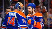 Jun 21, 2024; Edmonton, Alberta, CAN; Edmonton Oilers goaltender Stuart Skinner (74) and center Connor McDavid (97) celebrates win after defeating Florida Panthers in game six of the 2024 Stanley Cup Final at Rogers Place.