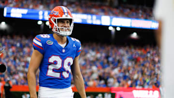 Aug 30, 2025; Gainesville, Florida, USA; Florida Gators place kicker Trey Smack (29) smiles after scoring a point against the Long Island Sharks during the first half at Ben Hill Griffin Stadium. Mandatory Credit: Matt Pendleton-Imagn Images