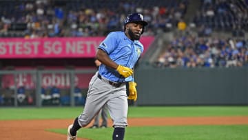 Jul 3, 2024; Kansas City, Missouri, USA; Tampa Bay Rays left fielder Randy Arozarena (56) rounds third base to score a run in the eighth inning against the Kansas City Royals at Kauffman Stadium. Mandatory Credit: Peter Aiken-USA TODAY Sports