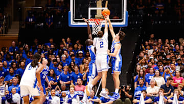 Oct 4, 2024; Durham, NC, USA; Duke Blue Devils center Stanley Borden (52) blocks guard Cooper Flagg (2) dunk during Countdown to Craziness at Cameron Indoor Stadium. Mandatory Credit: Jaylynn Nash-Imagn Images