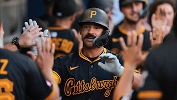 Mar 27, 2025; Miami, Florida, USA; Pittsburgh Pirates second baseman Nick Gonzales (39) celebrates with teammates after hitting a two-run home run against the Miami Marlins during the sixth inning at loanDepot Park. Mandatory Credit: Sam Navarro-Imagn Images