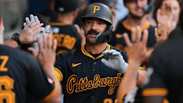 Mar 27, 2025; Miami, Florida, USA; Pittsburgh Pirates second baseman Nick Gonzales (39) celebrates with teammates after hitting a two-run home run against the Miami Marlins during the sixth inning at loanDepot Park. Mandatory Credit: Sam Navarro-Imagn Images
