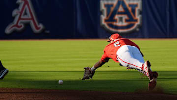 May 21, 2025; Hoover, AL, USA; Georgia second baseman Ryan Black (2) dives for a ball hit up the middle during the game with Oklahoma in the second round of the SEC Baseball Tournament at the Hoover Met.