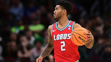 Mar 23, 2025; Cleveland, OH, USA; New Mexico Lobos guard Donovan Dent (2) dribbles in the first half against the Michigan State Spartans during the NCAA Tournament Second Round at Rocket Arena. Mandatory Credit: Ken Blaze-Imagn Images