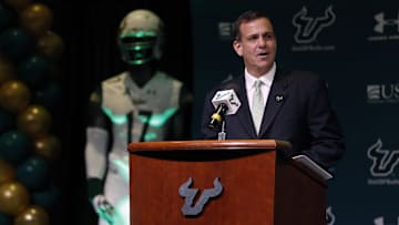 Before he went to Utah, Mark Harlan was USF's athletic director. Here we see him at the news conference where Charlie Strong was introduced as the head football coach