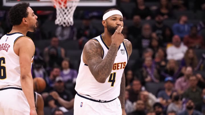 Mar 9, 2022; Sacramento, California, USA; Denver Nuggets center DeMarcus Cousins (4) gestures after scoring a three point basket against the Sacramento Kings during the third quarter at Golden 1 Center. Mandatory Credit: Kelley L Cox-USA TODAY Sports