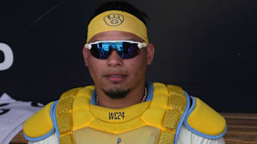 Mar 16, 2025; Phoenix, Arizona, USA; Milwaukee Brewers catcher William Contreras (24) gets ready for a game against the Cleveland Guardians at American Family Fields of Phoenix. Mandatory Credit: Rick Scuteri-Imagn Images