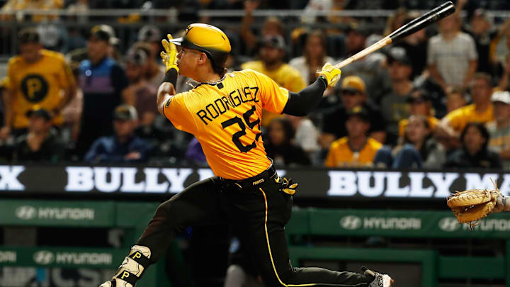 Sep 29, 2023; Pittsburgh, Pennsylvania, USA;  Pittsburgh Pirates catcher Endy Rodriguez (25) hits a single against the Miami Marlins during the sixth inning at PNC Park. Mandatory Credit: Charles LeClaire-Imagn Images