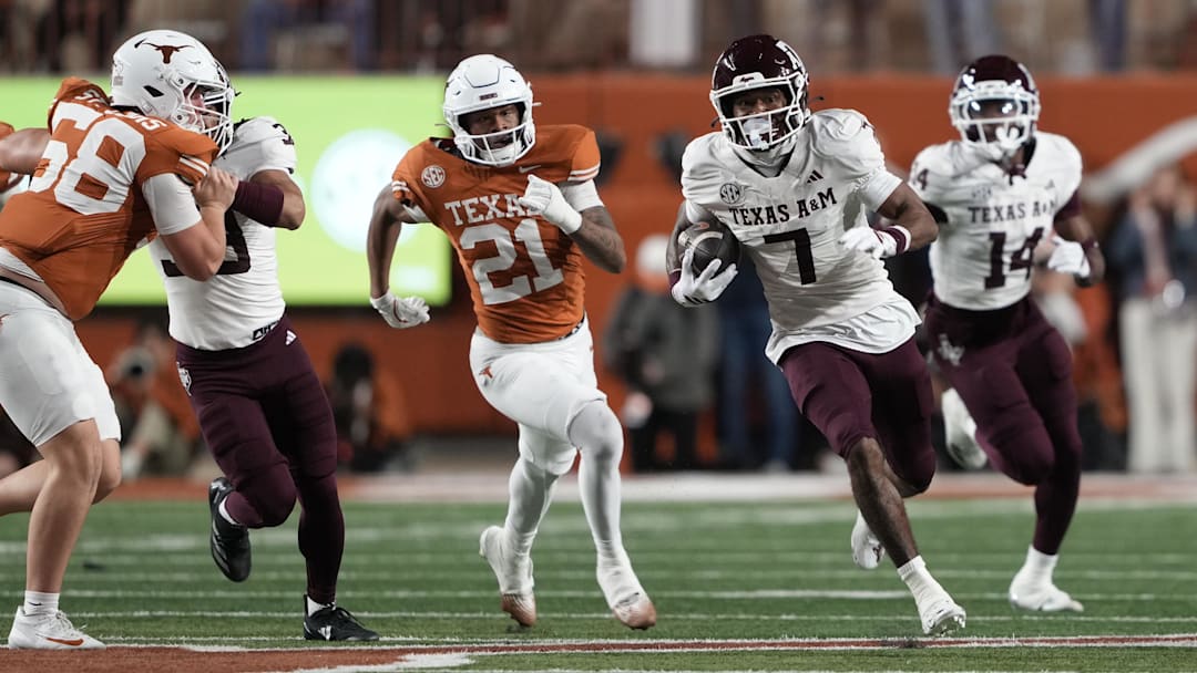 Nov 28, 2025; Austin, Texas, USA; Texas A&M Aggies wide receiver KC Concepcion (7) returns a punt during the first half against the Texas Longhorns at Darrell K Royal-Texas Memorial Stadium. Mandatory Credit: Scott Wachter-Imagn Images