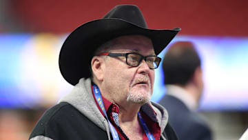 Professional wrestling commentator Jim Ross looks on before the 2019 Peach Bowl college football playoff semifinal game between the LSU Tigers and the Oklahoma Sooners.