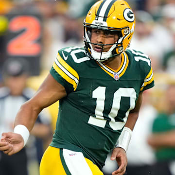 Aug 9, 2025; Green Bay, Wisconsin, USA;  Green Bay Packers quarterback Jordan Love (10) watches the ball after handing it off during the first quarter against the New York Jets at Lambeau Field. Mandatory Credit: Kayla Wolf-Imagn Images