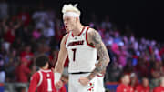 Nov 27, 2024; Paradise Island, Bahamas, BHS; Louisville Cardinals forward Kasean Pryor (7) reacts after dunking  during the second half against the Indiana Hoosiers at the Atlantis Resort.  Mandatory Credit: Kevin Jairaj-Imagn Images