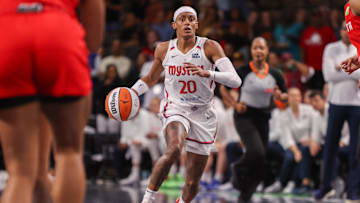 Aug 3, 2025; College Park, Georgia, USA; Washington Mystics guard Brittney Sykes (20) dribbles against the Atlanta Dream in the first quarter at Gateway Center Arena at College Park. 