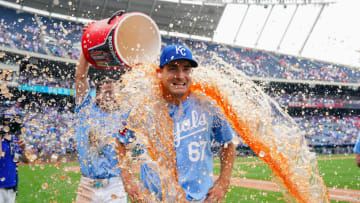 Jul 21, 2024; Kansas City, Missouri, USA; After pitching a complete game, Kansas City Royals starting pitcher Seth Lugo (67) is doused by shortstop Bobby Witt Jr. (7) after the win over the Chicago White Sox at Kauffman Stadium. Mandatory Credit: Denny Medley-USA TODAY Sports