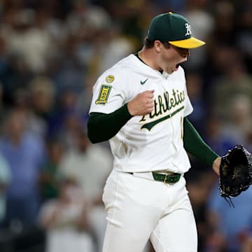 Jul 12, 2025; West Sacramento, California, USA; Athletics pitcher Mason Miller (19) reacts after defeating the Toronto Blue Jays 4-3 at Sutter Health Park. Mandatory Credit: Dennis Lee-Imagn Images