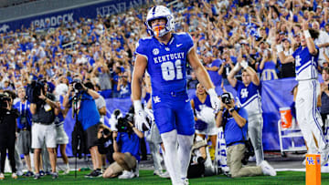 Sep 13, 2025; Lexington, Kentucky, USA; Kentucky Wildcats tight end Willie Rodriguez (81) holds the ball in the end zone after scoring a touchdown during the second quarter against the Eastern Michigan Eagles at Kroger Field. Mandatory Credit: Jordan Prather-Imagn Images