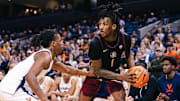 Mar 4, 2025; Charlottesville, Virginia, USA; Florida State Seminoles guard Jamir Watkins (1) controls the ball while Virginia Cavaliers guard Dai Dai Ames (7) defends in the first half at John Paul Jones Arena. Mandatory Credit: Emily Faith Morgan-Imagn Images