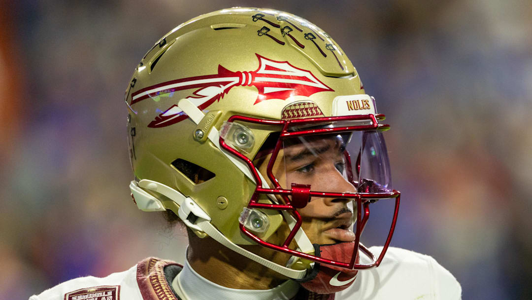 Nov 29, 2025; Gainesville, Florida, USA; Florida State Seminoles quarterback Tommy Castellanos (1) during the second quarter against the Florida Gators at Ben Hill Griffin Stadium. Mandatory Credit: Bob Kupbens-Imagn Images