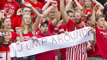 Sep 20, 2014; Madison, WI, USA; Wisconsin Badgers fans take part in the traditional Jump Around between the third and fourth quarters against the Wisconsin Badgers at Camp Randall Stadium.   Wisconsin won 68-17.  Mandatory Credit: Jeff Hanisch-Imagn Images