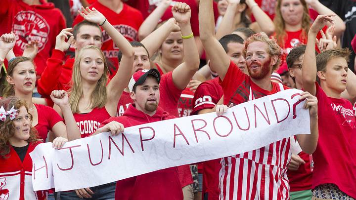 Sep 20, 2014; Madison, WI, USA; Wisconsin Badgers fans take part in the traditional Jump Around between the third and fourth quarters against the Wisconsin Badgers at Camp Randall Stadium.   Wisconsin won 68-17.  Mandatory Credit: Jeff Hanisch-Imagn Images