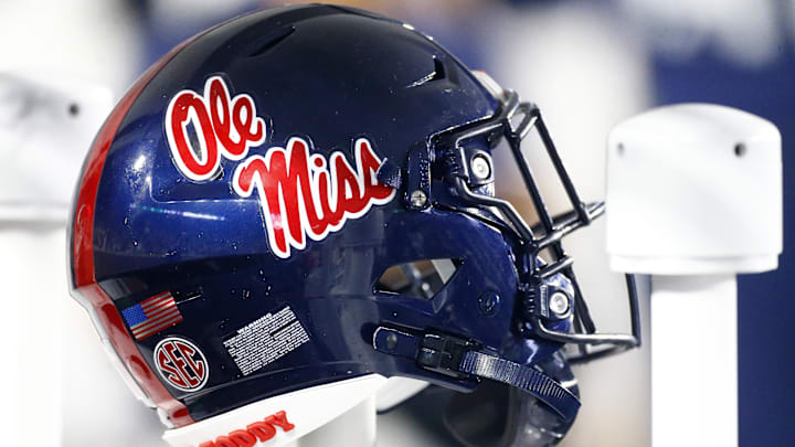 Aug 31, 2024; Oxford, Mississippi, USA; Mississippi Rebels helmet on the sideline during the second half against the Furman Paladins at Vaught-Hemingway Stadium. Mandatory Credit: Petre Thomas-Imagn Images Aug 31, 2024; Oxford, Mississippi, USA; Mississippi Rebels helmet on the sideline during the second half against the Furman Paladins at Vaught-Hemingway Stadium. Mandatory Credit: Petre Thomas-Imagn Images