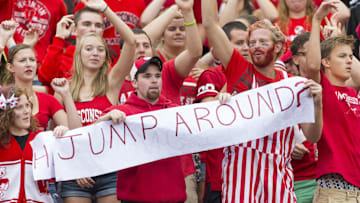 Sep 20, 2014; Madison, WI, USA; Wisconsin Badgers fans take part in the traditional Jump Around between the third and fourth quarters against the Wisconsin Badgers at Camp Randall Stadium.   Wisconsin won 68-17.  Mandatory Credit: Jeff Hanisch-Imagn Images