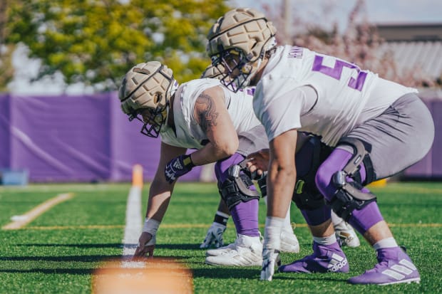 Zach Henning (58) got some spring work in at guard and center for the Huskies. 