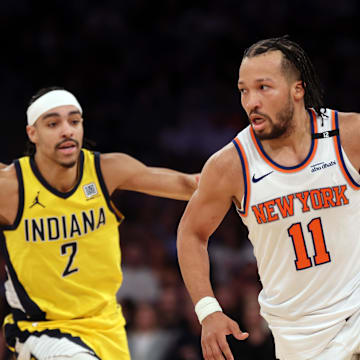 New York Knicks guard Jalen Brunson controls the ball against Indiana Pacers guard Andrew Nembhard. Mandatory Credit: Vincent Carchietta-Imagn Images