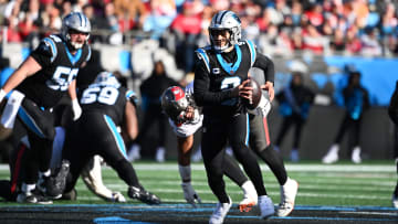 Jan 7, 2024; Charlotte, North Carolina, USA;  Carolina Panthers quarterback Bryce Young (9) scrambles in the third quarter at Bank of America Stadium. Mandatory Credit: Bob Donnan-USA TODAY Sports