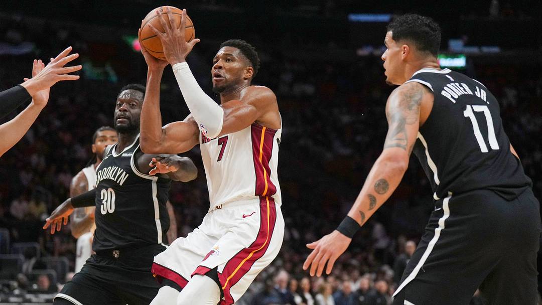 Oct 14, 2026; Miami, Florida, USA; Miami Heat forward Giannis Antetokounmpo (7) goes up for a shot as Brooklyn Nets forward Julius Randle (30) and forward Michael Porter Jr. (17) defend during the second half at Kaseya Center. Mandatory Credit: Jim Rassol-Imagn Images Oct 14, 2026; Miami, Florida, USA; Miami Heat forward Giannis Antetokounmpo (7) goes up for a shot as Brooklyn Nets forward Julius Randle (30) and forward Michael Porter Jr. (17) defend during the second half at Kaseya Center. Mandatory Credit: Jim Rassol-Imagn Images