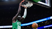 Apr 12, 2024; Boston, Massachusetts, USA; Boston Celtics center Neemias Queta (88) makes the basket vs. the Charlotte Hornets.