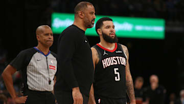Jan 9, 2025; Memphis, Tennessee, USA; Houston Rockets head coach Ime Udoka talks with Houston Rockets guard Fred VanVleet (5) during the third quarter against the Memphis Grizzlies at FedExForum. Mandatory Credit: Petre Thomas-Imagn Images