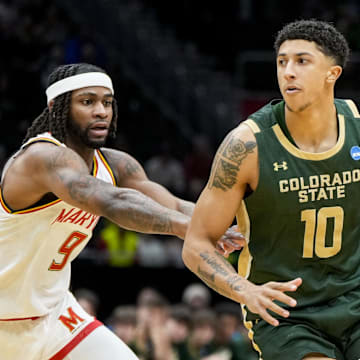 Mar 23, 2025; Seattle, WA, USA; Maryland Terrapins guard Selton Miguel (9) defends against Colorado State Rams guard Nique Clifford (10) in the first half at Climate Pledge Arena. Mandatory Credit: Stephen Brashear-Imagn Images