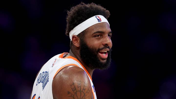 Apr 11, 2025; New York, New York, USA; New York Knicks center Mitchell Robinson (23) reacts during the first quarter against the Cleveland Cavaliers at Madison Square Garden. Mandatory Credit: Brad Penner-Imagn Images