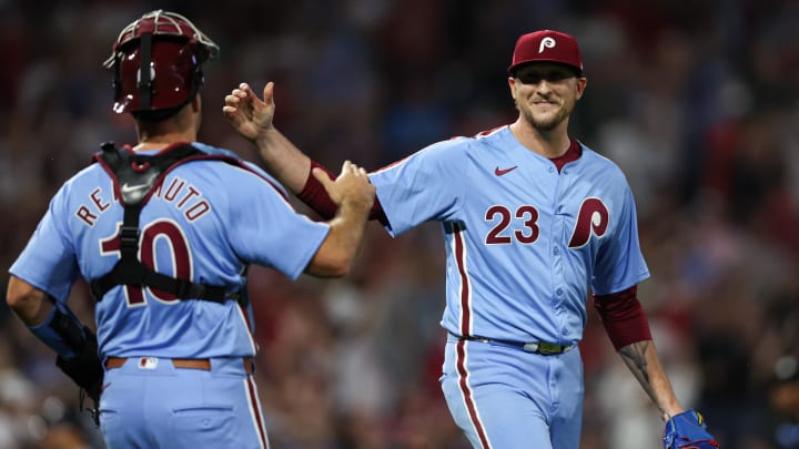 Aug 29, 2024; Philadelphia, Pennsylvania, USA; Philadelphia Phillies pitcher Jeff Hoffman and catcher J.T. Realmuto shake hands after a victory.