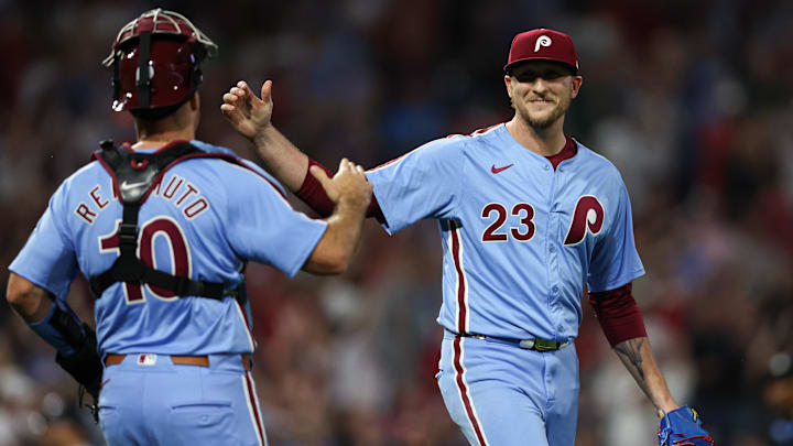 Aug 29, 2024; Philadelphia, Pennsylvania, USA; Philadelphia Phillies pitcher Jeff Hoffman (23) and catcher J.T. Realmuto (10) shake hands after a victory against the Atlanta Braves at Citizens Bank Park.