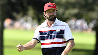 Sep 28, 2025; Bethpage, New York, USA; Team USA golfer Cameron Young reacts on the first green on the final day of competition for the Ryder Cup at Bethpage Black. Mandatory Credit: Dennis Schneidler-Imagn Images