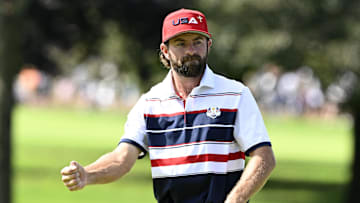 Sep 28, 2025; Bethpage, New York, USA; Team USA golfer Cameron Young reacts on the first green on the final day of competition for the Ryder Cup at Bethpage Black. Mandatory Credit: Dennis Schneidler-Imagn Images
